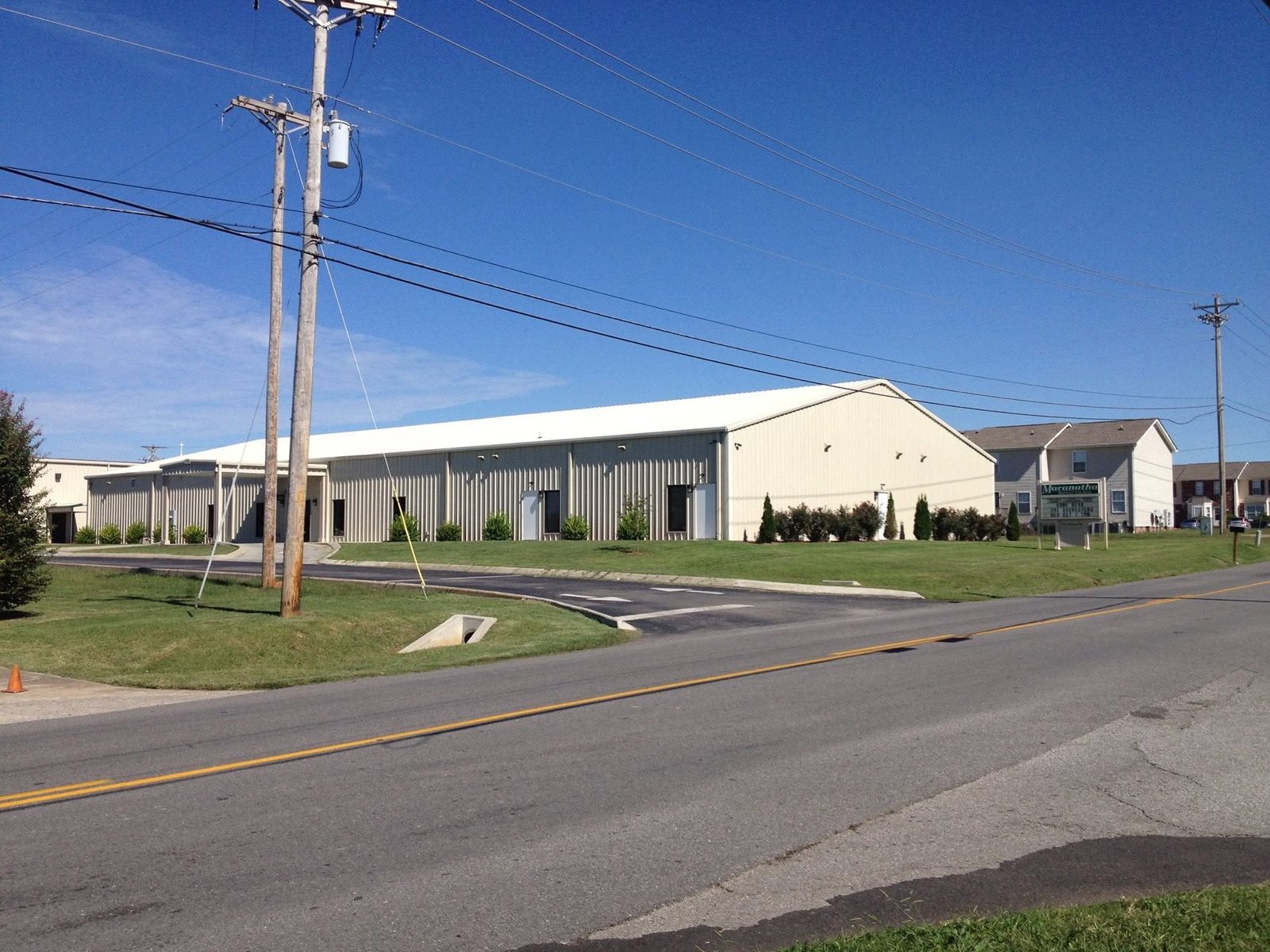 Warehouse interior with mezzanine and office storefront
