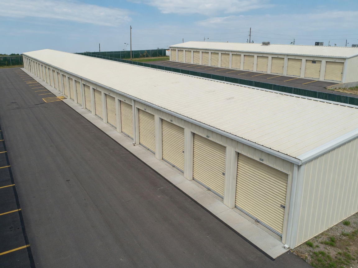 Mini storage PEB facility exterior with rows of roll-up doors