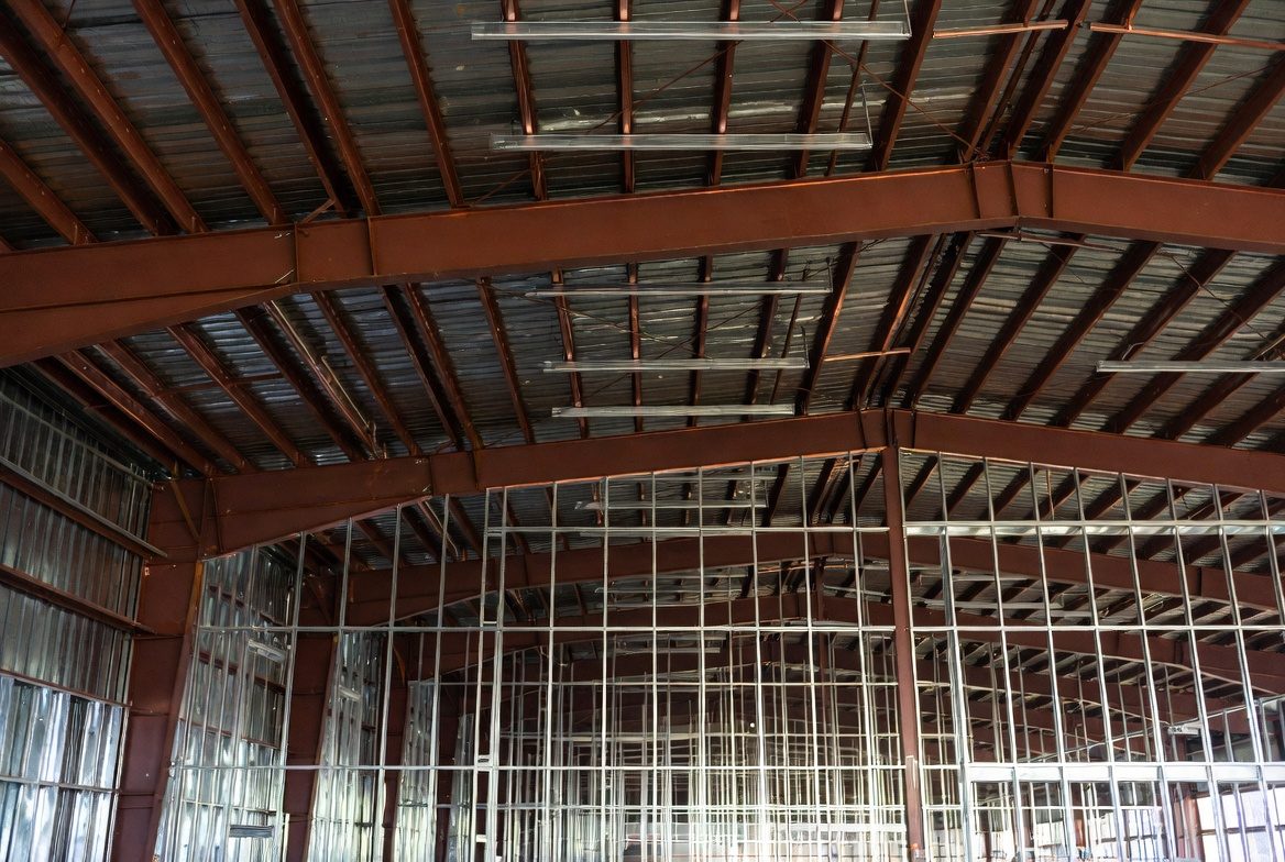 Interior view of metal building roof purlins and primary frames