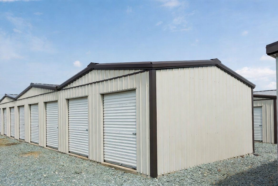 Row of cream mini storage units with white roll-up doors