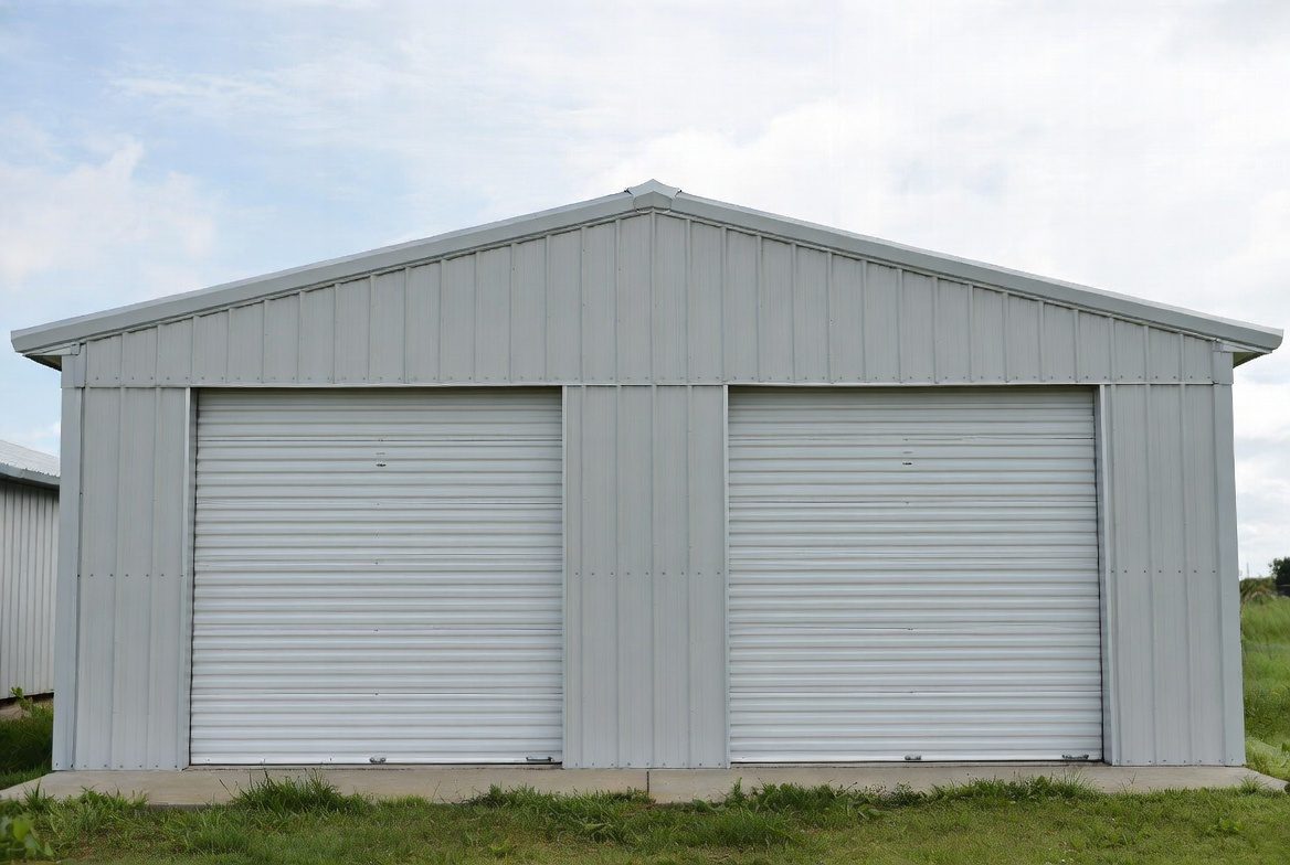 Wide gable mini storage building with continuous roof and roll-up doors