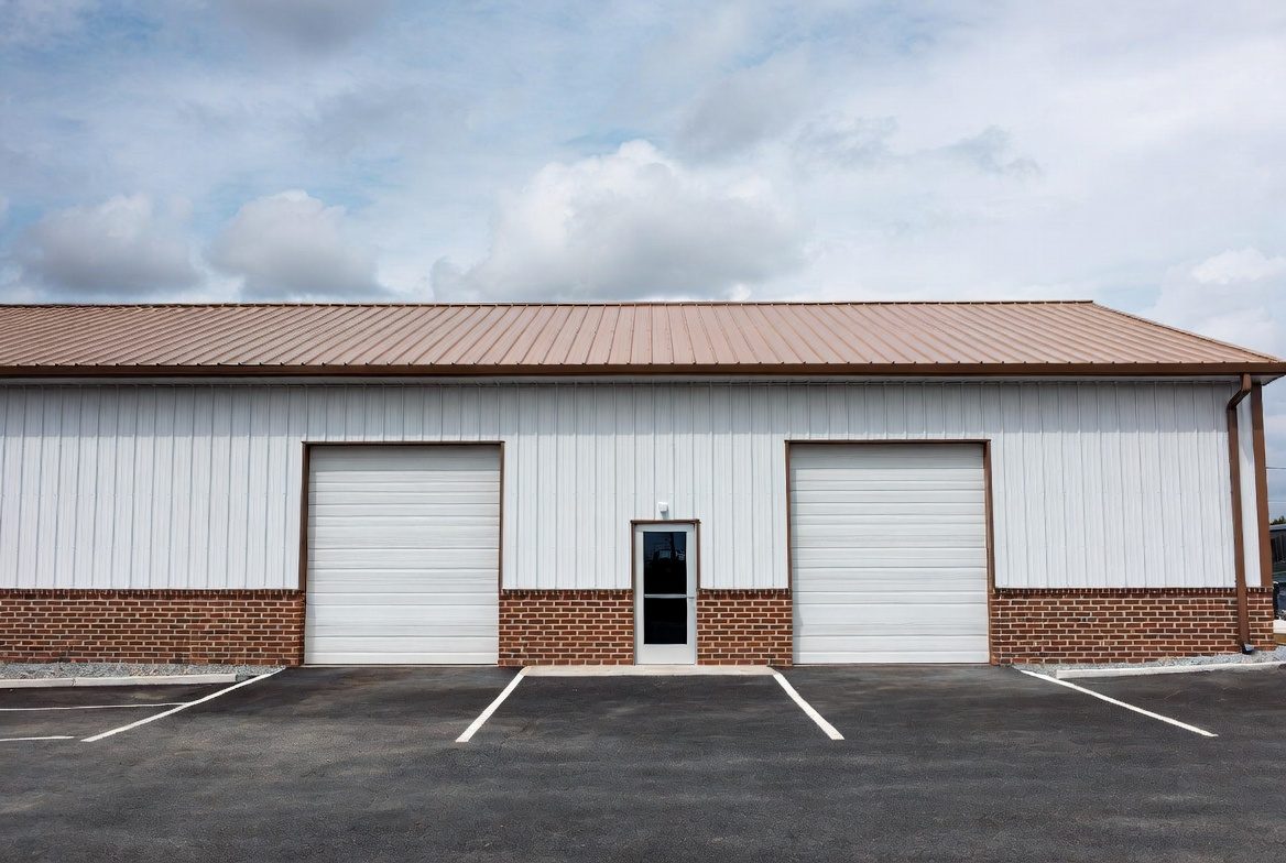 White brick wainscot · copper roof